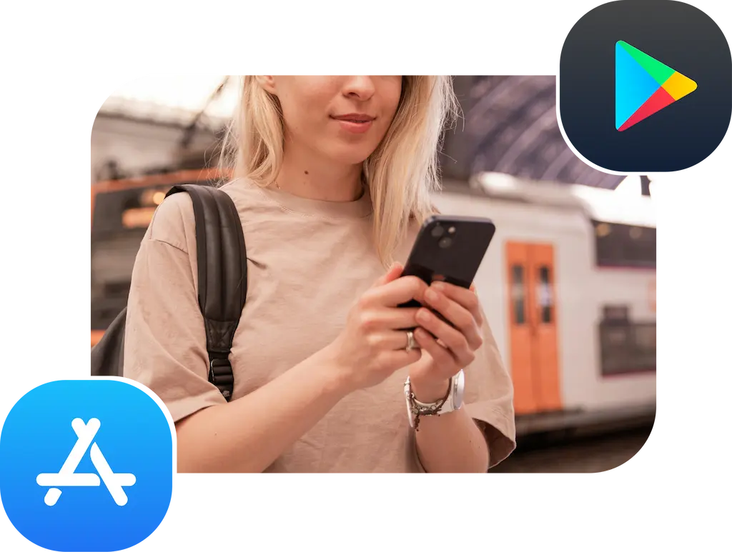 Noia estudiant mentre està esperant el tren